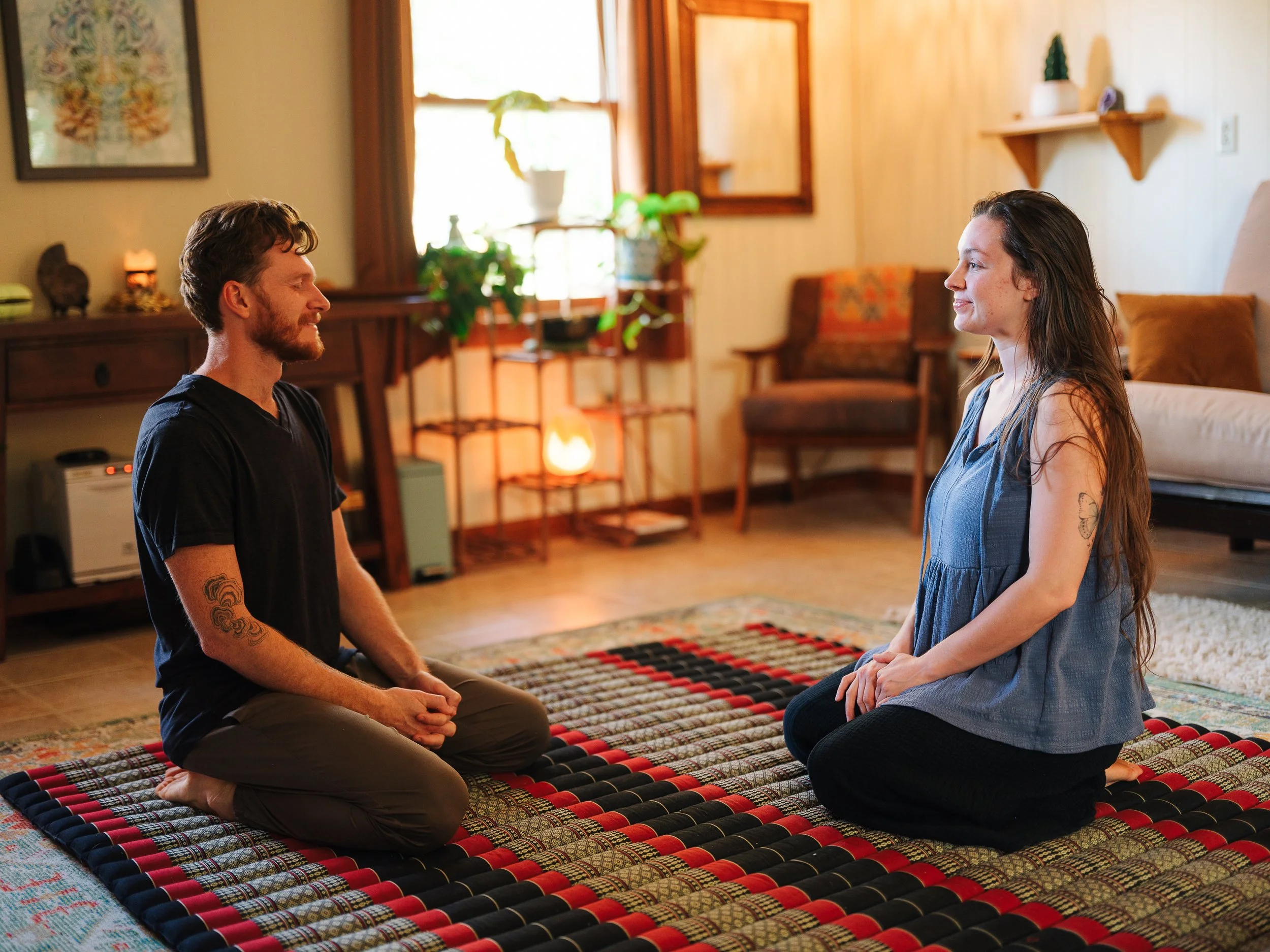 Michael and client in seated meditation before session