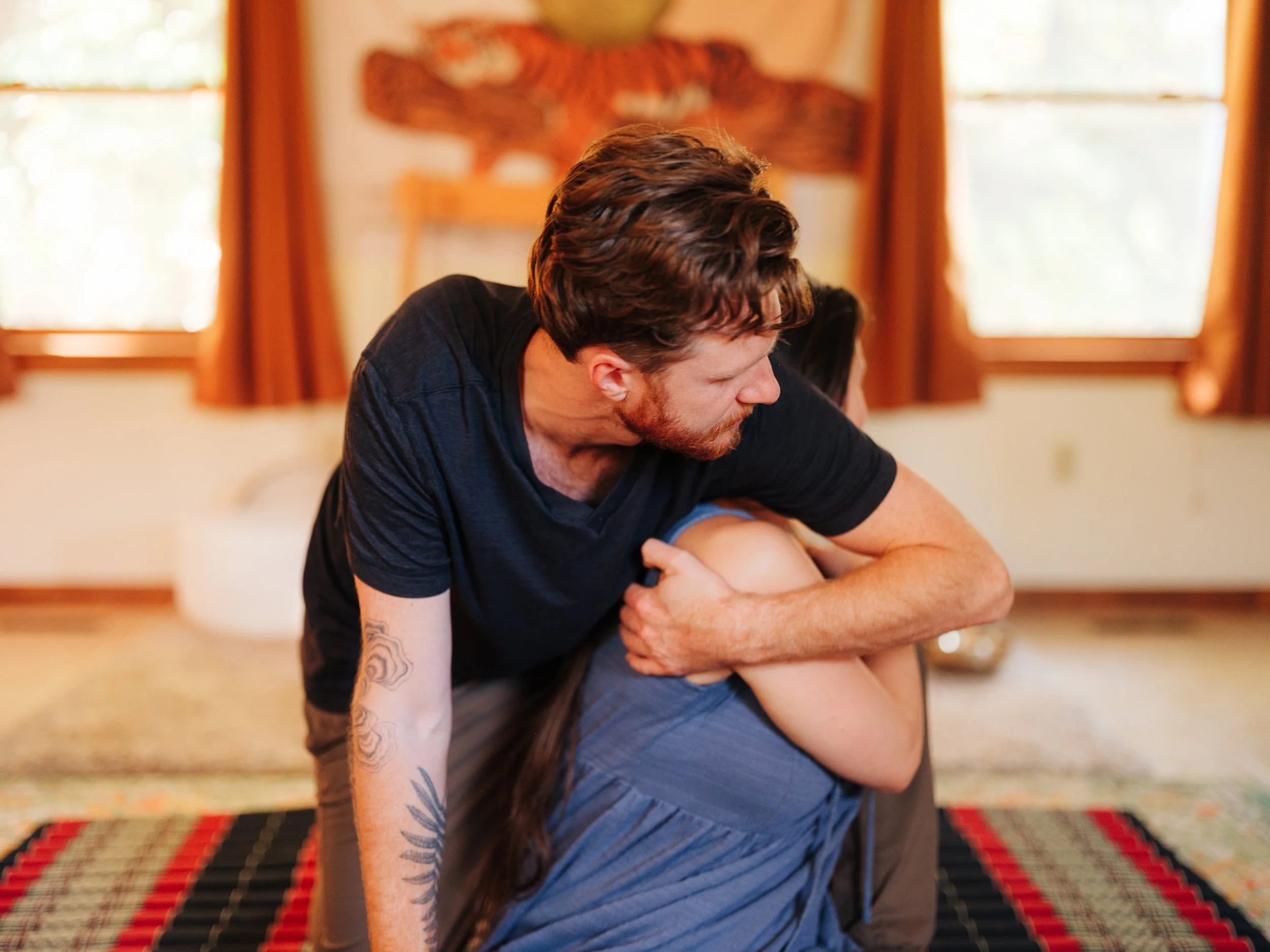 Seated Thai shoulder and arm compression