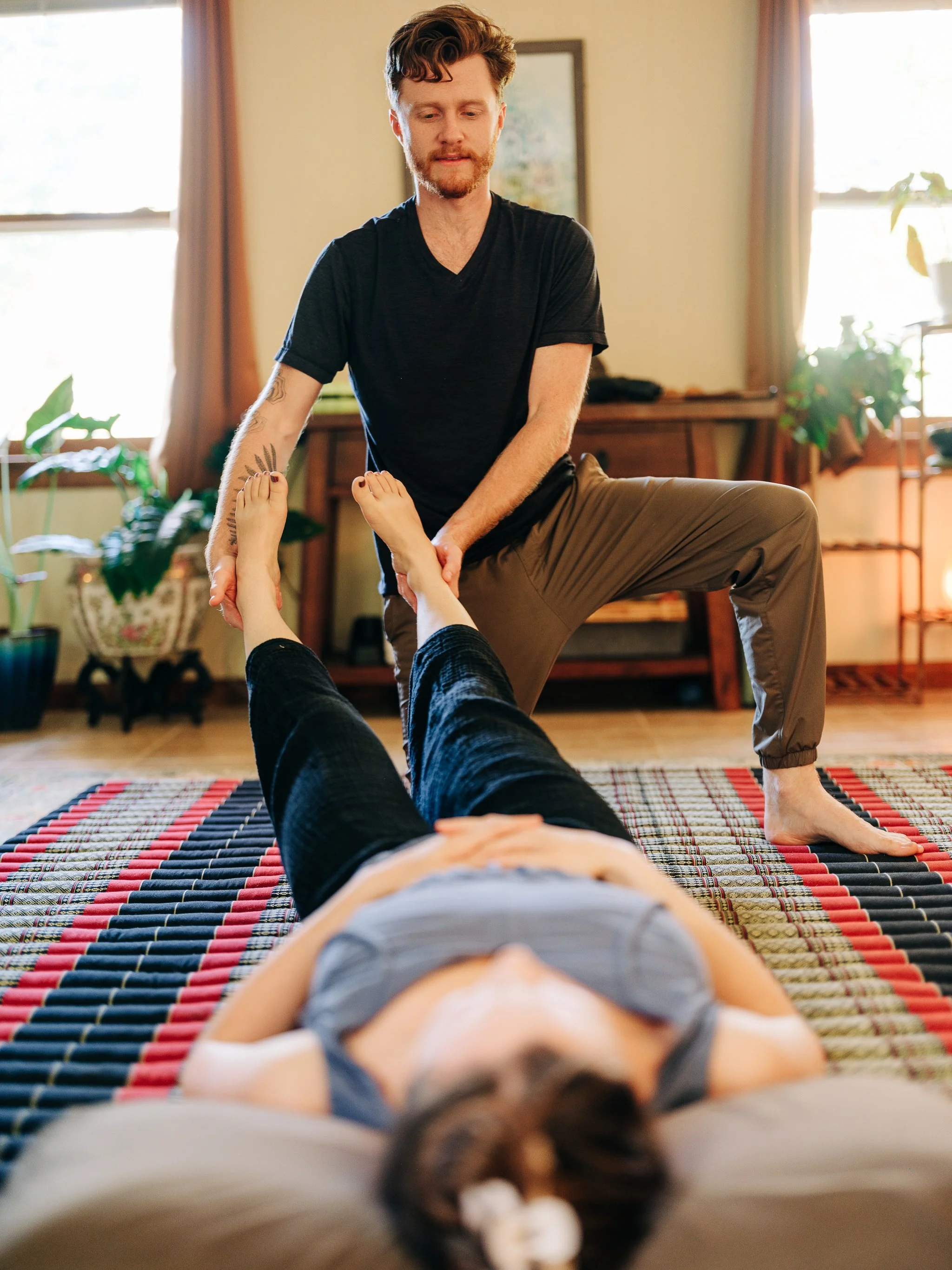 Standing Thai foot and leg stretch